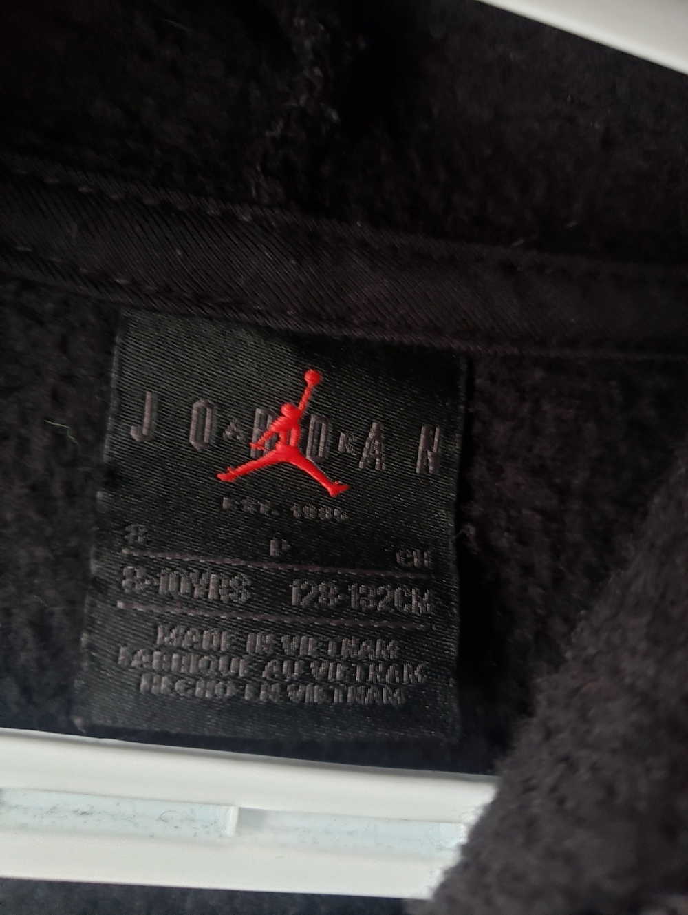 Jordan Black Fleece Jacket with Red Jumpman Logo